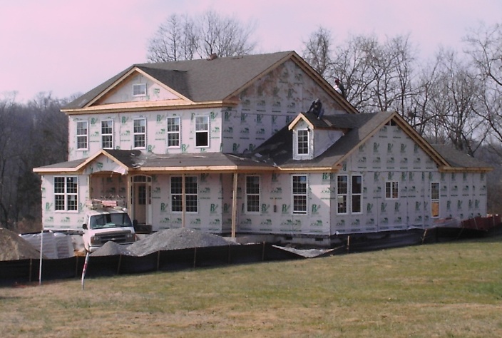 Photo of outside of rough stage residential construction