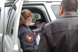 Safety Seat Technician Officer Rachel Gober inspects seat