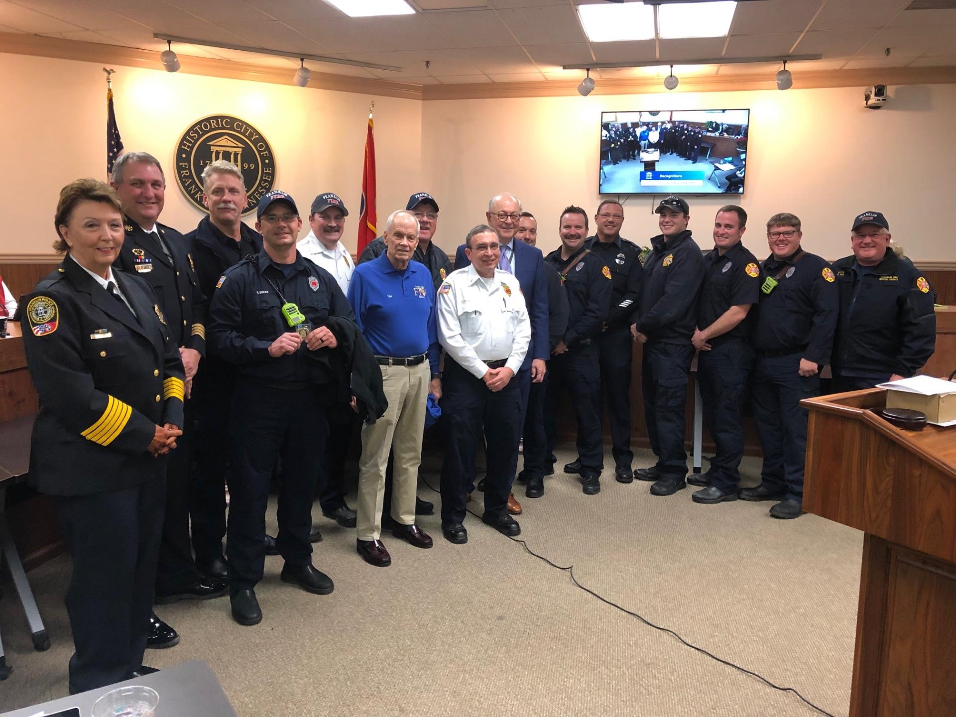 Firefighters who were honored for saving a life